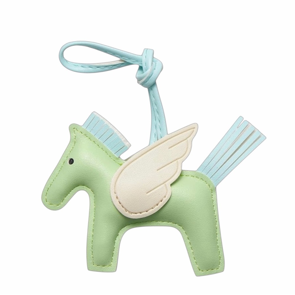 TU.LX Green Horse-Shaped Bag Charm with blue and cream accent  NWT